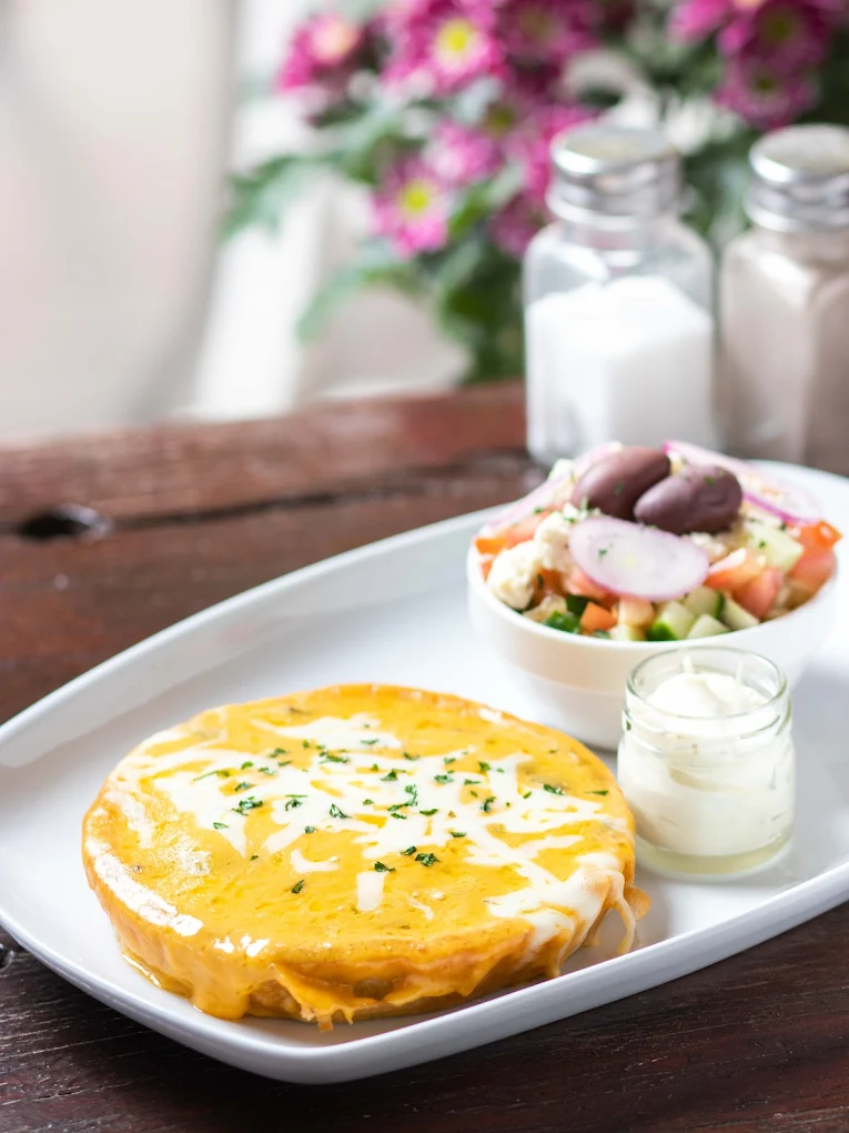 Quiche of the day with a fresh Greek salad